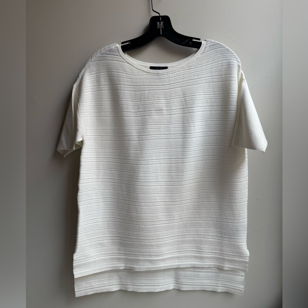 Saks white ribbed shirt. Boxy cut, short sleeves.